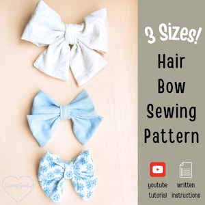 May include: Three fabric hair bows in different patterns and colors, including solid white, solid light blue, and a blue floral print. The text reads 3 Sizes! Hair Bow Sewing Pattern, youtube tutorial, and written instructions.