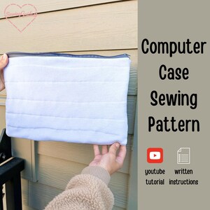 May include: A white quilted computer case with a dark gray zipper closure. The text on the right side reads Computer Case Sewing Pattern, with icons for a YouTube tutorial and written instructions. The case has horizontal stitching lines.