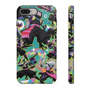 May include: A phone case featuring a vibrant, multi-coloured graphic print of stylised frog warriors in dynamic poses. The design incorporates bright shades of teal, pink, yellow, and black, with floating eyeballs and sharp geometric patterns throughout.