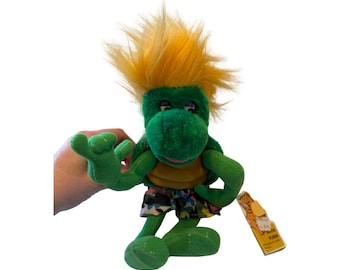 Pantalones cortos de camuflaje con pelo naranja neón y peluche verde tortuga de Guffa, estilo vintage de los 90, con etiquetas.