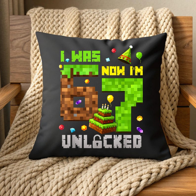 May include: Black square throw pillow with a pixelated design. The pillow features the text "I WAS 6 NOW I'M 7 UNLOCKED" in green and white. A pixelated cake, balloons, and confetti complete the birthday theme.