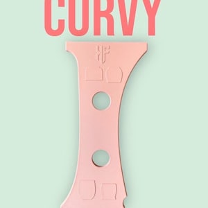 May include: A pink rib tool with the word "CURVY" in large pink letters above it. The tool has a unique shape with two circular holes and several curved edges. The text "Rib Tool" is at the bottom.