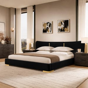 May include: A black upholstered bed frame with a curved headboard and gold-toned metal feet. The bed is dressed with white pillows and a white duvet featuring a brown runner. Two dark wood nightstands with gold lamps flank the bed.