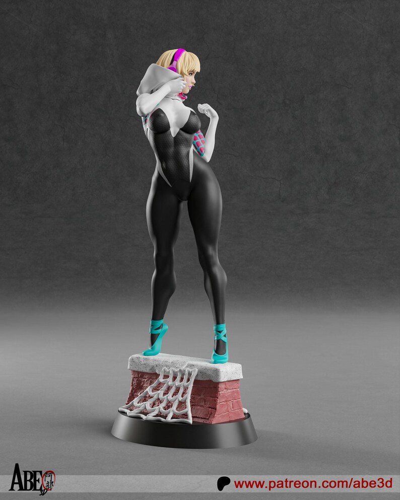 May include: A 3D-printed figurine of a female superhero in a black and white bodysuit, with a hood and pink accents. She stands on a brick chimney base, wearing teal shoes. The figurine has blonde hair and is in a dynamic pose.