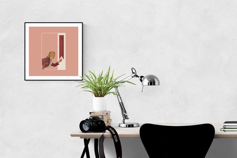 May include: A square framed wall art print featuring a muted pink background and a vertical rectangular panel. The illustration depicts a person with blonde hair wearing a red jacket, reaching toward a white arrow pointing upward with the word SWIPE.
