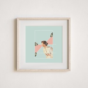 May include: A square framed art print featuring a collage of a person in a light-colored shirt centered within a pale green background. Three security cameras are positioned around the figure, with a pink triangular shape and white dotted lines.