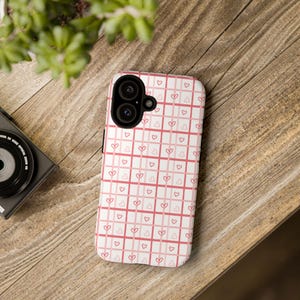 IPhone 16 Teen Pink Heart Grid Phone Case | Tough Case