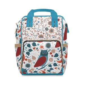 Mochila cambiador/bolsa para pañales con estampado floral de búho azul y rojo
