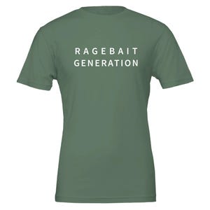 May include: A sage green t-shirt with the white text "RAGEBAIT GENERATION" printed on the front. The shirt has short sleeves and a crew neck.