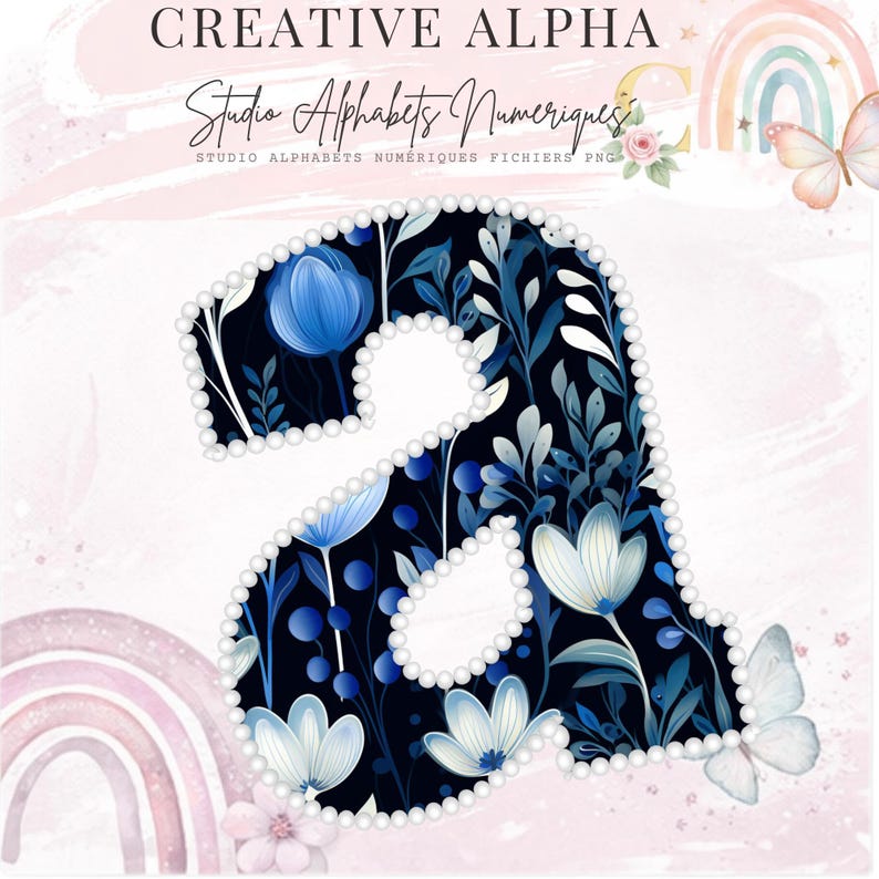 May include: A decorative letter "a" with a floral design. The letter is filled with blue and white flowers and foliage against a dark background. The outline is adorned with a pearl-like border. The image includes the text "CREATIVE ALPHA" and "Studio Alphabets Numeriques".