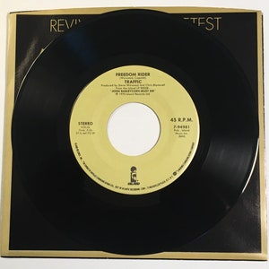 Traffic / Freedom Rider (première fois en 45 aux États-Unis) & Paper Sun / Island '85 45 Mint!