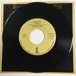 Trafic / Pages vides & Quarante Mille Headman / Island '85 45 Mint!