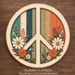 May include: Round peace sign with a white border and a distressed wood-look background in shades of blue, green, orange, and tan. The peace symbol is decorated with white daisies, orange flowers, and green leaves. The sign is a wreath and made of UV protected aluminum.