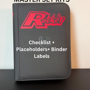 May include: A black binder with the text "TEAM ROCKET MASTER SET KITS" in white and red. The binder also has the text "Checklist + Placeholders + Binder Labels". The Team Rocket logo is in red.