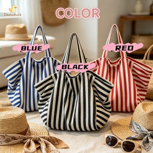 May include: Three tote bags with vertical stripes in blue, black, and red. Each bag features two handles and a soft, unstructured shape. The text "COLOR" appears at the top, with "BLUE," "BLACK," and "RED" labels pointing to each bag.