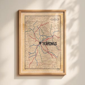 Peut inclure: Une carte encadrée de style ancien de la Géorgie avec une icône d'étoile noire centrale et le mot TERMINUS en lettres noires grasses. La carte présente une topographie beige complexe avec des lignes rouges, bleues et vertes superposées.