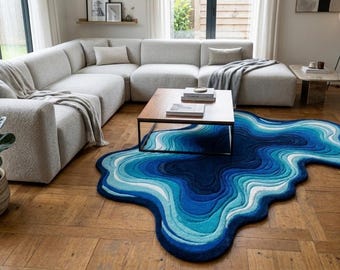 Alfombra de lana tejida a mano con diseño de olas oceánicas, alfombra abstracta moderna orgánica en azul.