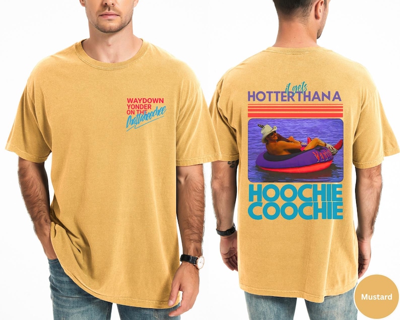May include: Mustard-colored t-shirt with the text "WAYDOWN YONDER ON THE Chattahoochee" on the front. The back features a graphic with the text "it gets HOTTERTHANA HOOCHIE COOCHIE".