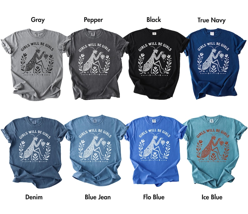 May include: A collection of eight short-sleeved crew neck t-shirts in various colours including grey, pepper, black, navy, denim, blue jean, flo blue, and ice blue. Each shirt features a graphic of a praying mantis with the text Girls Will Be Girls.
