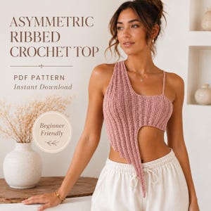 May include: A dusty rose, asymmetric ribbed crochet top featuring a single thin shoulder strap and a pointed, uneven hemline. The text on the image reads: ASYMMETRIC RIBBED CROCHET TOP, PDF PATTERN, Instant Download, and Beginner Friendly.