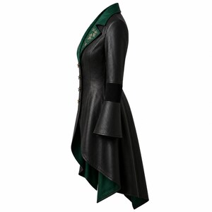May include: A black long-sleeved coat with a high-low hemline, featuring a dark green lapel with floral embroidery. The coat has a row of small gold buttons along the front closure, flared cuffs, and a solid black exterior with a green interior lining.