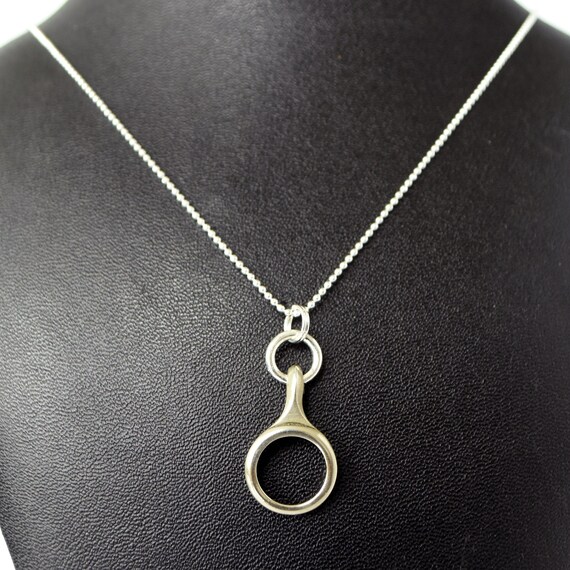 Clarinet key best sale necklace