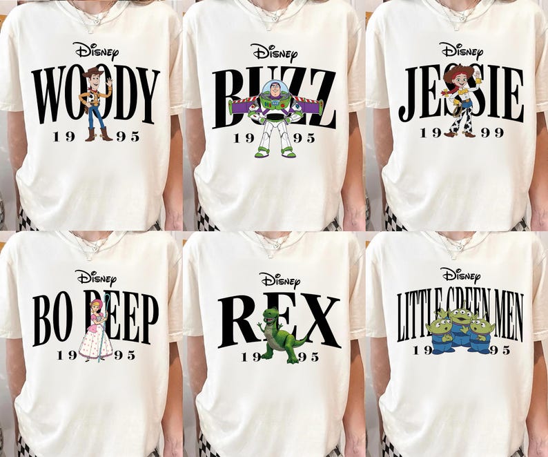 May include: Cream-colored t-shirts featuring Disney's Toy Story characters: Woody, Buzz, Jessie, Bo Peep, Rex, and the Little Green Men. Each shirt has the character's name in bold black letters, the Disney logo, and the year 1995 or 1999.