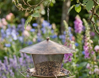 Comedero colgante vintage para pájaros, de metal, para jardín exterior, resistente a la lluvia.