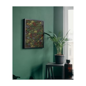 May include: A white ceramic mug with a black handle and the text "But First, Coffee" in a black, handwritten-style font. The mug is on a white surface.