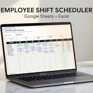 May include: A laptop displaying an employee shift scheduler in Google Sheets and Excel. The screen shows a detailed schedule with employee names, shift times, and total hours. A small potted succulent sits to the right.