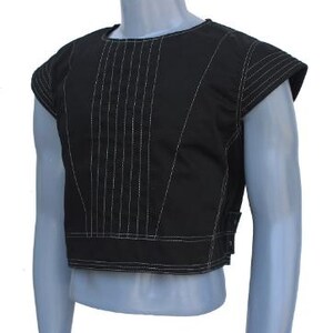 May include: Black vest with white stitching details. The vest has a round neckline and short sleeves. Vertical white stitching runs down the front. The vest is displayed on a mannequin.