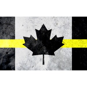 May include: A rectangular design featuring a black maple leaf on a distressed white and gray background, bisected by a horizontal yellow stripe. The design has black and gray squares on each side.