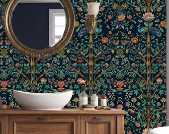 May include: A bathroom vanity with a wooden cabinet, a white vessel sink, and a round mirror. The wall features dark wallpaper with a repeating pattern of colorful flowers, green foliage, and blue peacocks. Rolled towels are stored on the lower shelf.