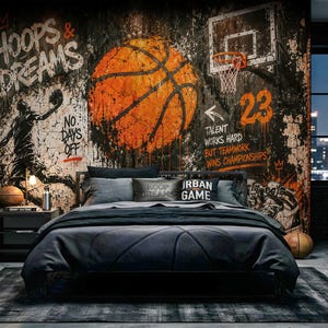May include: A bedroom featuring a large wall mural with a basketball theme, including a large orange basketball, a hoop, and graffiti-style text reading HOOPS & DREAMS, NO DAYS OFF, and TALENT WORKS HARD BUT TEAMWORK WINS CHAMPIONSHIPS, with a bed in front.