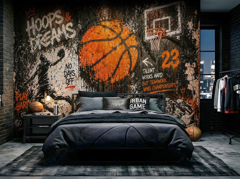 May include: A bedroom featuring a large wall mural with a basketball theme, including a large orange basketball, a hoop, and graffiti-style text reading HOOPS & DREAMS, NO DAYS OFF, and TALENT WORKS HARD BUT TEAMWORK WINS CHAMPIONSHIPS, with a bed in front.