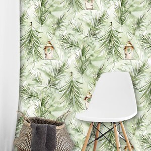 May include: Wallpaper featuring a repeating pattern of green pine branches and small brown birdhouses on a light green background. A woven basket with a dark grey cloth and a white chair with wooden legs are positioned in front of the wall.