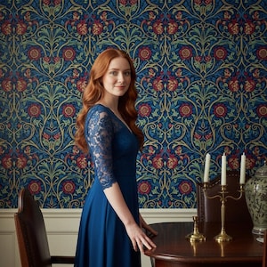May include: A dark blue dress featuring a lace bodice with three-quarter length sleeves and a solid, flowing skirt. The garment has a V-neckline and is constructed with a fitted waist that transitions into a full, floor-length skirt silhouette.