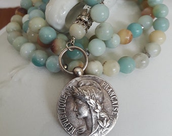 Vintage repurposed jewelry necklace assemblage silver republique francaise French medal Atelier Paris blue aqua long pendant tassel rosary