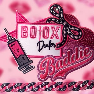 May include: A decorative patch set featuring a white rectangular sign with the text "BOTOX Dealer" in pink and black, a syringe icon, a black and white checkered bow, and a pink glittery heart patch with the word "Baddie" in pink script.