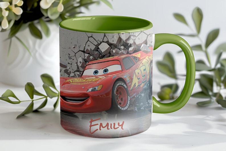 May include: A ceramic mug featuring a red race car design with the name "Emily" in red script. The mug has a green handle and interior, with a background of a cracked wall. The mug is a fun item for fans of the animated movie.
