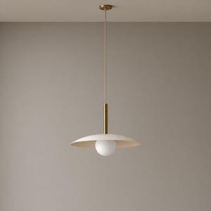 May include: A contemporary pendant light. It features a white, disc-shaped shade and a spherical white bulb. The fixture has a brass stem and a thin, gold-coloured hanging rod. The light hangs from the ceiling.