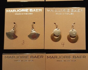 Marjorie Baer small Earrings, mixed Metals 1 inch and 1.5 inches in length, great with any Autfit. 38.00 each. Choose the number You like