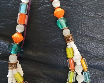 Necklace, brilliant beads summer colors. Adjusts to 18" Hand made in California. Carol Kent.