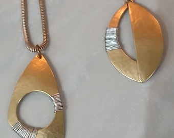 Two new wire wrapped Marjorie Baer necklaces in playful classic design. Mixed metals.