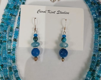 Handmade necklace with five strands of turquoise crystals by California artist Carol Kent.