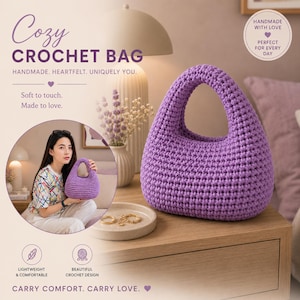May include: A vibrant purple crochet bag with a rounded silhouette and an integrated handle. The bag features a dense, textured stitch pattern throughout its exterior. The design is compact and structured, showcasing a consistent yarn color and weave.