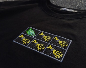 Tango Inventoryの刺繍入りオーバーサイズTシャツ