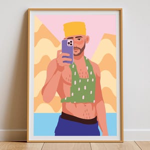 May include: A framed art print featuring a stylized illustration of a person taking a selfie. The person is wearing a yellow hat, green top with white polka dots, and blue shorts. The background includes a pink sky and orange mountains.
