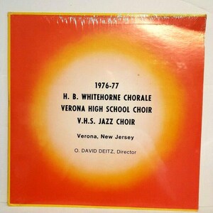 May include: A red and yellow poster with white text announcing the 1976-77 Verona High School Choir and Jazz Choir performances. The text also includes the name of the director, O. David Deitz.
