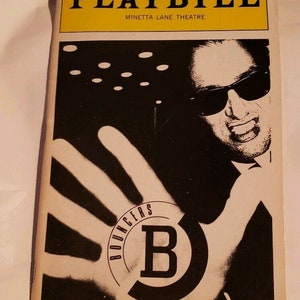 May include: Black and white Playbill for the play "Bouncers" at the Minetta Lane Theatre. The cover features a close-up of a man's face wearing sunglasses and a hand with a black circle with a white "B" inside.